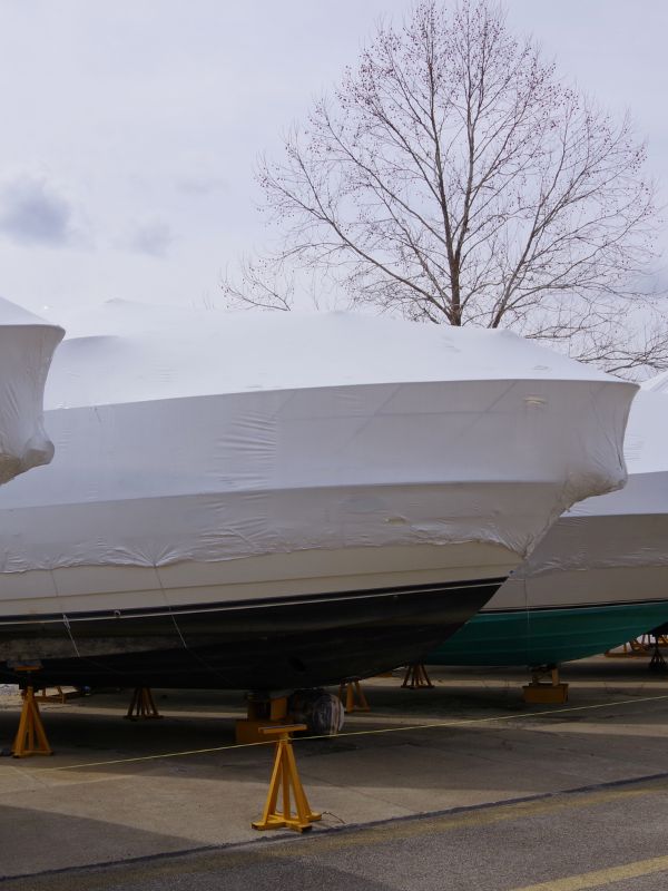 Boats with shrink wrap on them