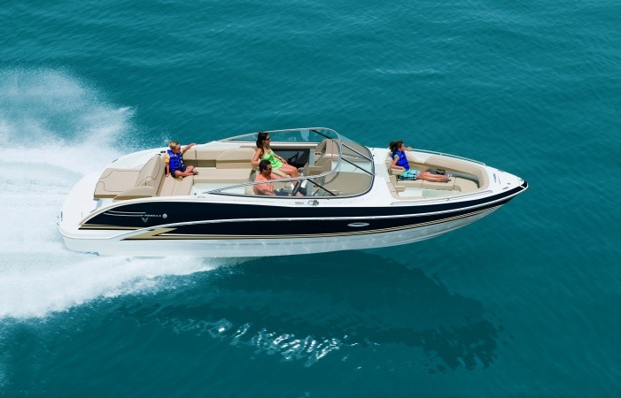 family riding in boat