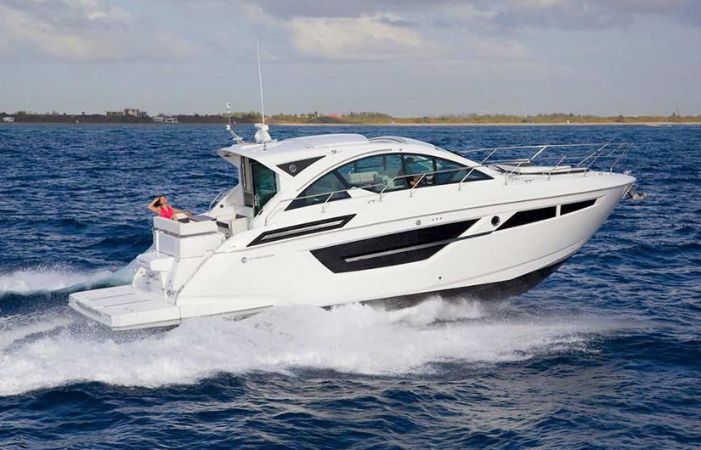 cabin cruiser boat cruising in the water