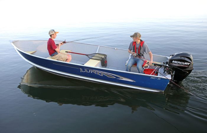 kids fishing in a fishing boat