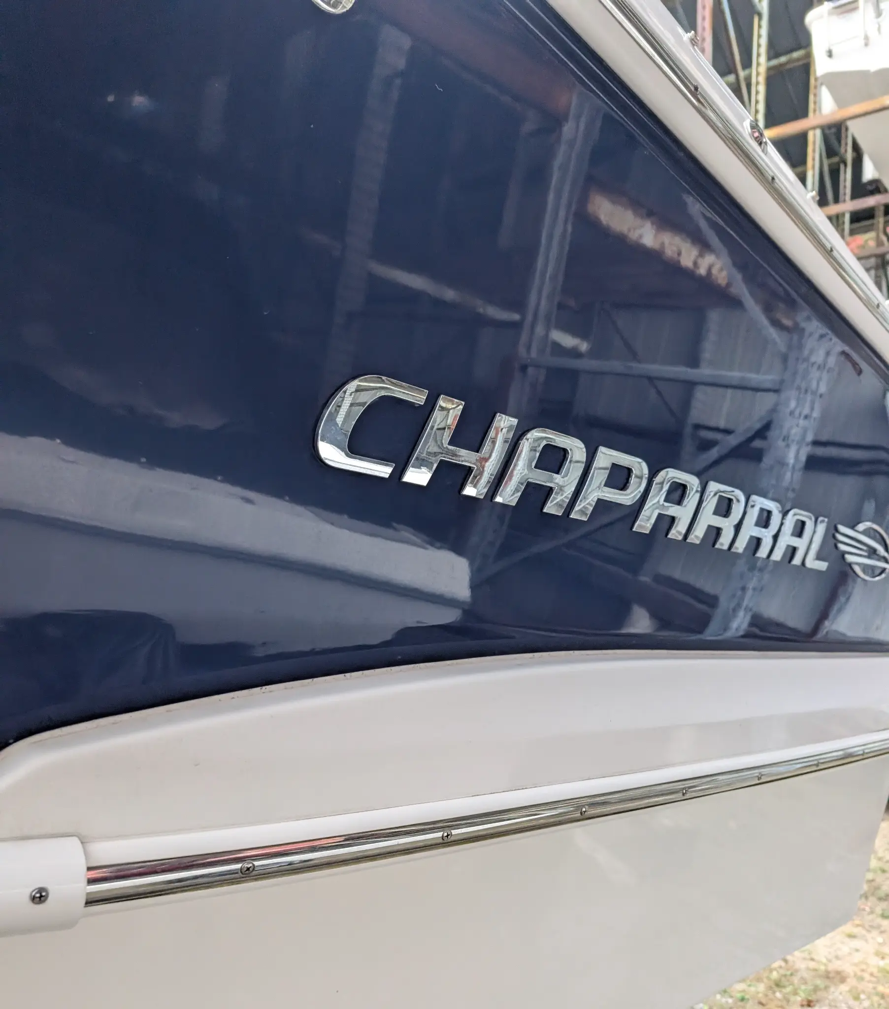 Chaparral boat hull before detailing with a dull, oxidized finish