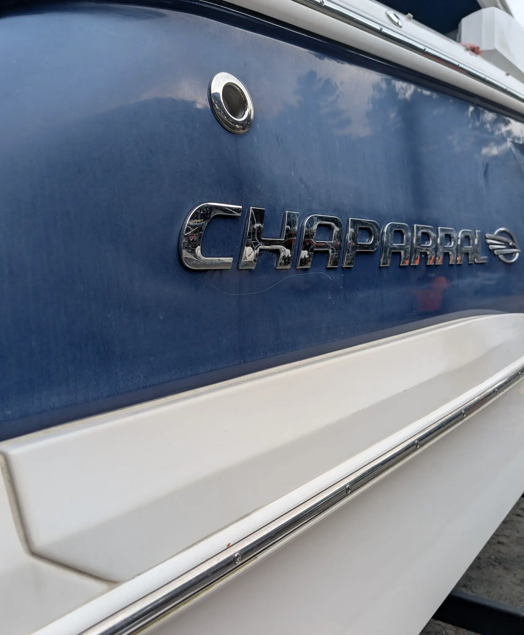 Chaparral boat hull after detailing with a restored, high-gloss finish