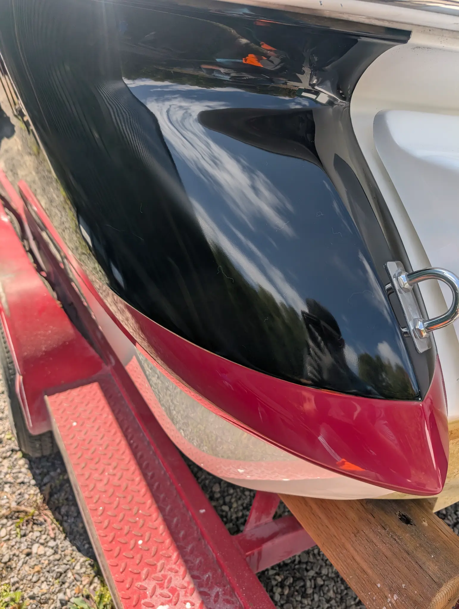 Cobalt stern panel after polishing with deep gloss and sharp reflection