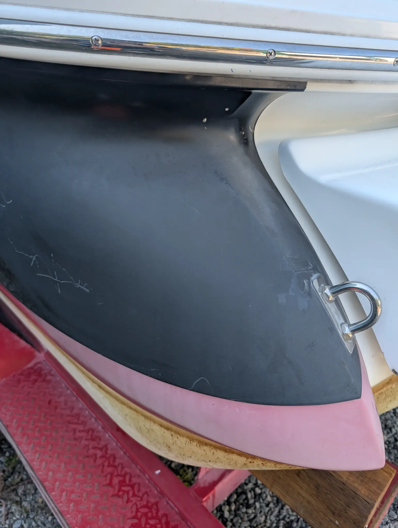 Cobalt stern panel before detailing with oxidation, haze, and reduced clarity